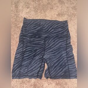 Lululemon, size 8, 8 inch, has pockets and is in great condition!!